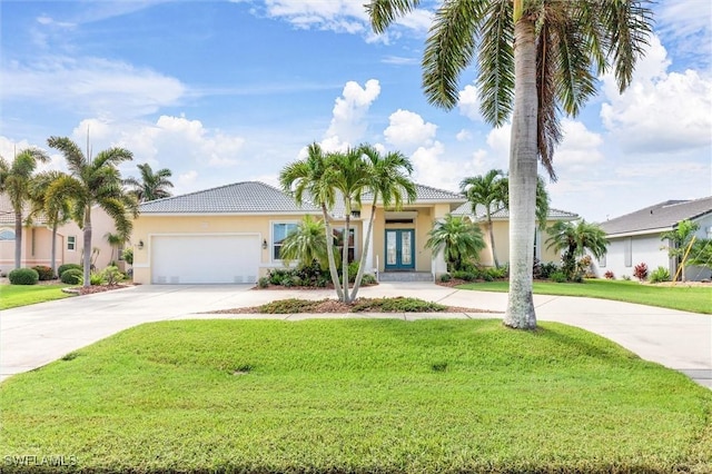 view of front of home with driveway, a front lawn, and stucco siding