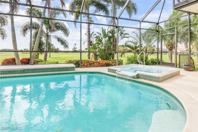 view of swimming pool featuring an in ground hot tub, glass enclosure, and a yard