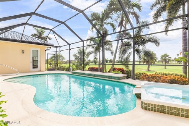 view of pool featuring an in ground hot tub and glass enclosure