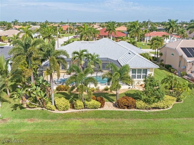 birds eye view of property with a residential view