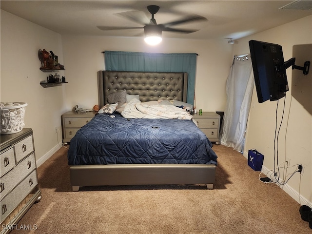 bedroom featuring ceiling fan and carpet floors