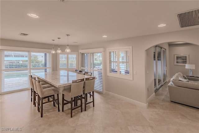 dining room featuring light tile patterned floors