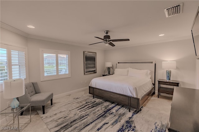 bedroom with ornamental molding and ceiling fan