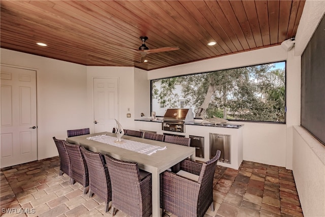 exterior space featuring wooden ceiling and ceiling fan