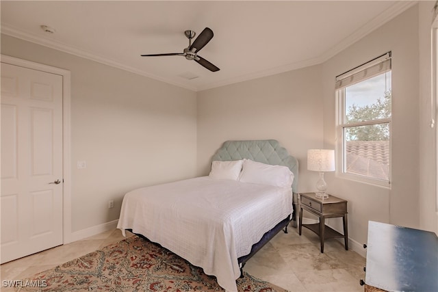 tiled bedroom with ornamental molding and ceiling fan