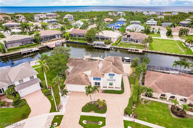 drone / aerial view with a water view