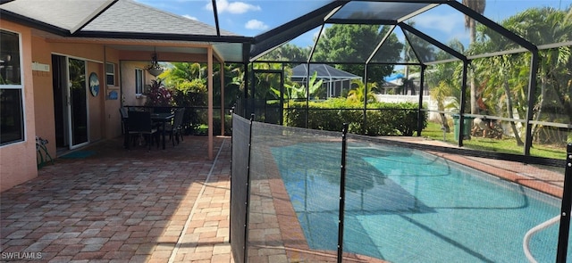 view of pool featuring a lanai and a patio