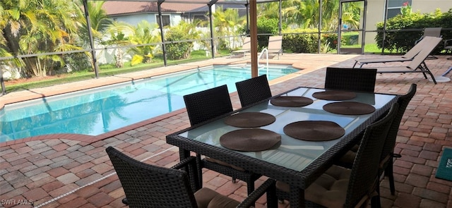 view of pool featuring a patio