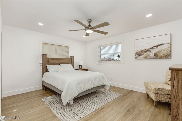 bedroom with baseboards, ceiling fan, recessed lighting, and light wood-style floors