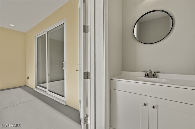 bathroom with vanity and walk in shower