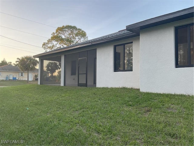 exterior space featuring a lawn