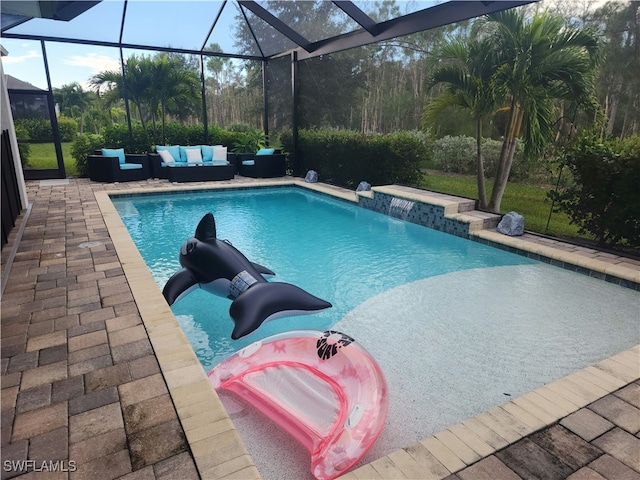 view of swimming pool with a lanai, pool water feature, and outdoor lounge area