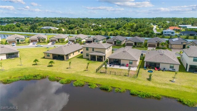 drone / aerial view with a water view