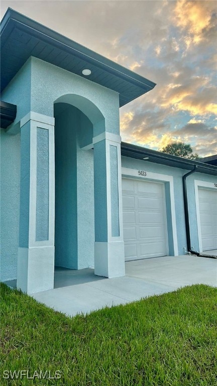 exterior space featuring a garage