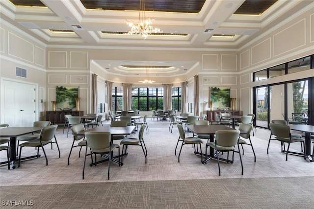 carpeted dining area featuring a decorative wall, a notable chandelier, and coffered ceiling