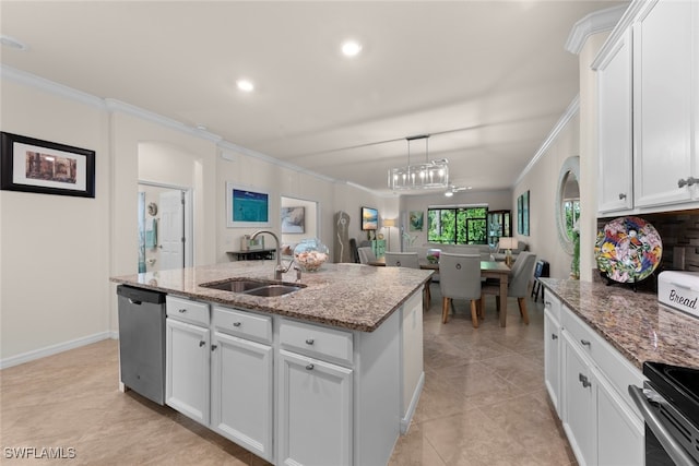 kitchen with stainless steel dishwasher, sink, white cabinetry, and a center island with sink