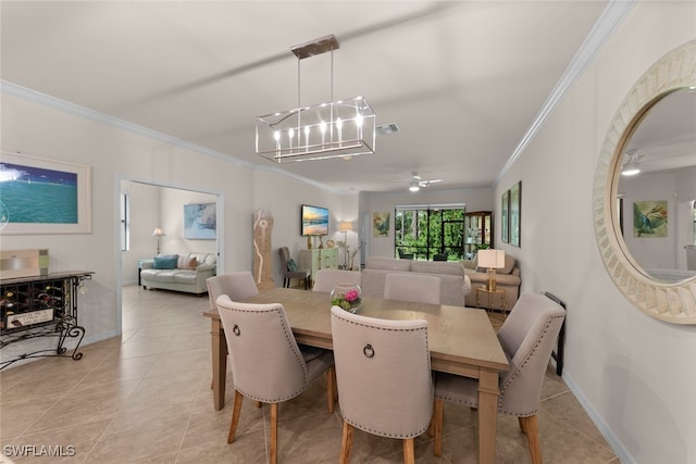 dining area with crown molding and light tile patterned floors