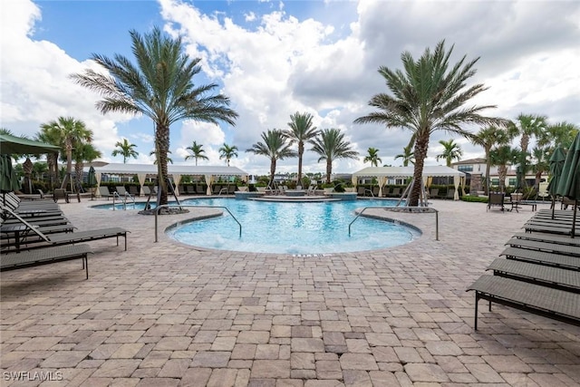 pool with a patio