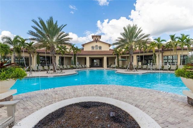 pool featuring a patio area