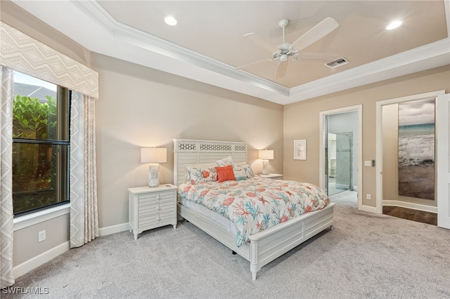 bedroom with baseboards, visible vents, ornamental molding, light carpet, and a raised ceiling