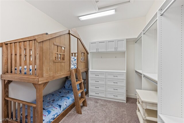 bedroom with light colored carpet