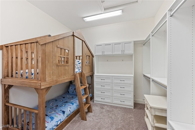 bedroom featuring light carpet