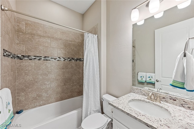 bathroom featuring toilet, vanity, and shower / tub combo