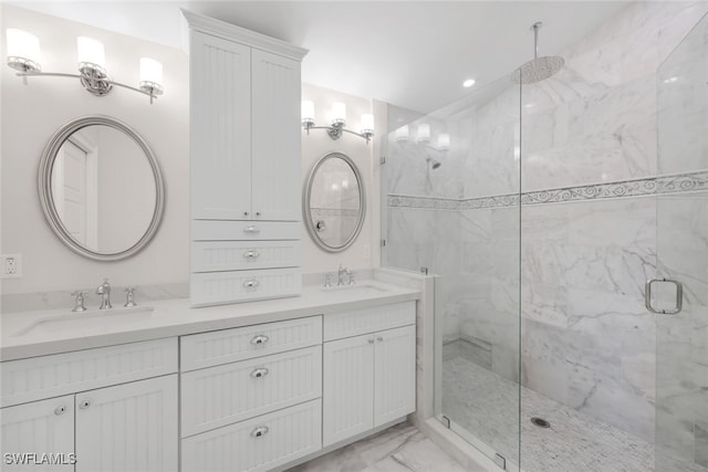 bathroom with an enclosed shower and vanity