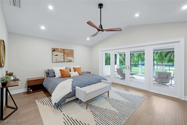 bedroom with ceiling fan, access to exterior, light hardwood / wood-style flooring, lofted ceiling, and french doors