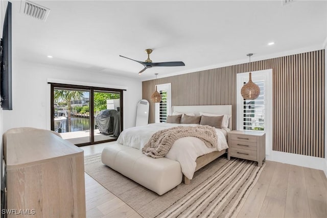 bedroom with ceiling fan, recessed lighting, visible vents, access to exterior, and hardwood / wood-style floors