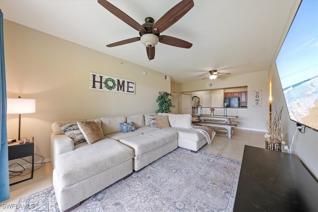 living room with ceiling fan