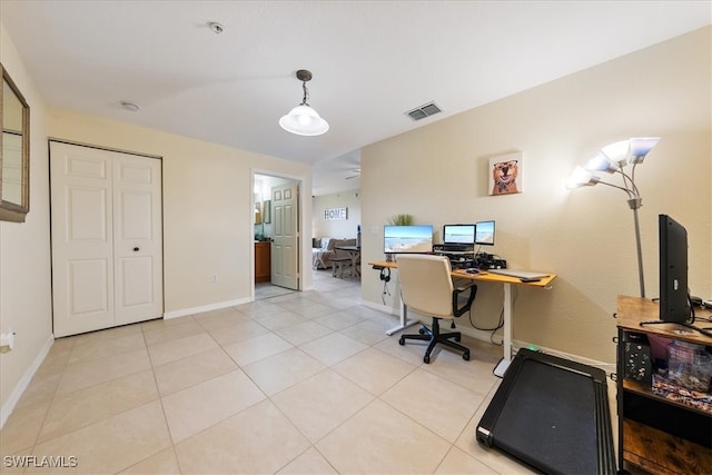 office area with light tile patterned floors