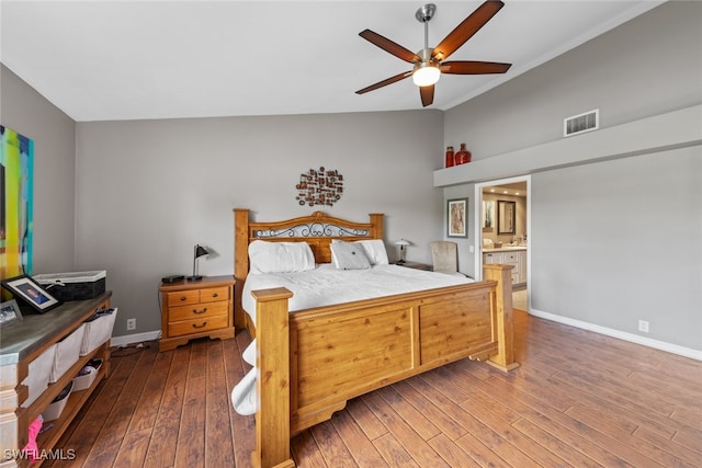 bedroom featuring high vaulted ceiling, hardwood / wood-style flooring, ensuite bathroom, and ceiling fan