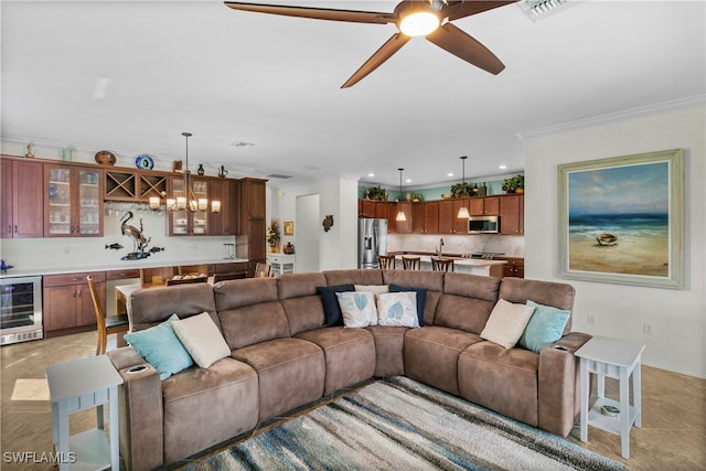 living room featuring wine cooler, ceiling fan, and ornamental molding