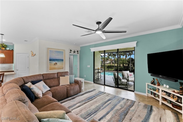 living room with ceiling fan, light tile patterned floors, and crown molding