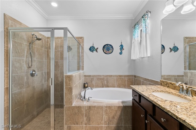 bathroom featuring plus walk in shower, vanity, and ornamental molding