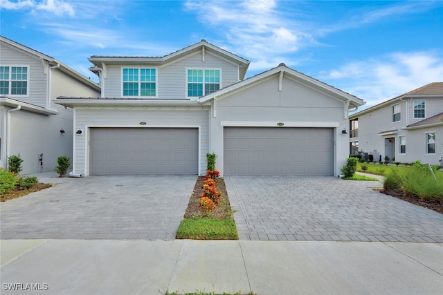 view of front of property featuring a garage