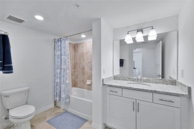 full bathroom with tile patterned flooring, vanity, toilet, and shower / bath combo with shower curtain