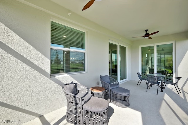 view of patio / terrace featuring ceiling fan