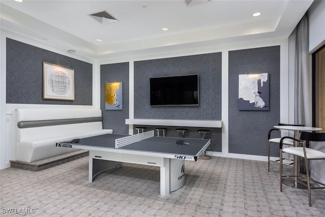 recreation room with carpet floors