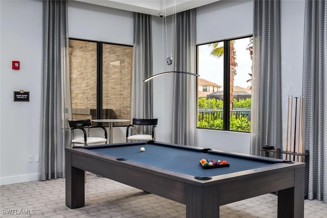 rec room with light colored carpet and pool table