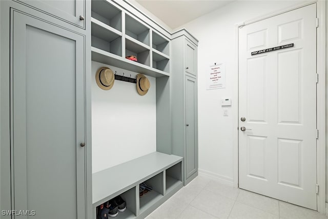 mudroom with light tile patterned floors