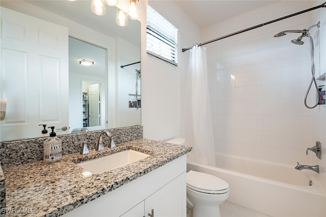 full bathroom featuring vanity, toilet, and shower / bath combo with shower curtain