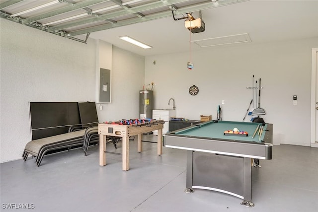 game room with electric panel, electric water heater, concrete flooring, and billiards