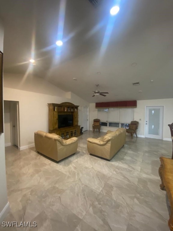 living room featuring ceiling fan