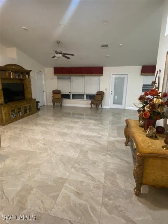 living room featuring ceiling fan