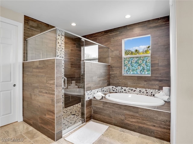 bathroom featuring plus walk in shower