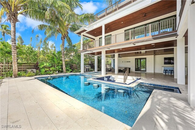 view of swimming pool featuring a patio