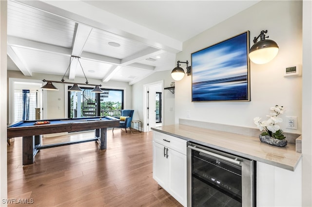 bar featuring wine cooler, dark wood-type flooring, white cabinetry, hanging light fixtures, and pool table