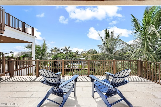 view of patio featuring a water view